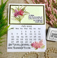 2025/07/01/Teaspoon-of-Fun-Deb-Valder-Tuberose-stencil-flowers-washi-tape-sunshine-smiles-calendar-July-2025-baroque-embossing-folder-foil-1_by_djlab.jpg